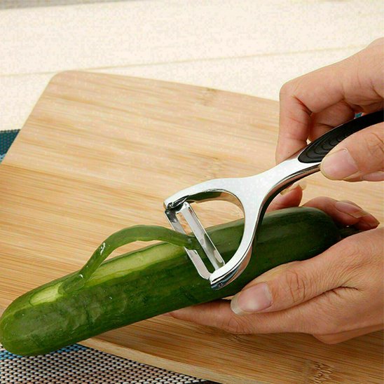 Epluche legume ergonomique pour peler concombre